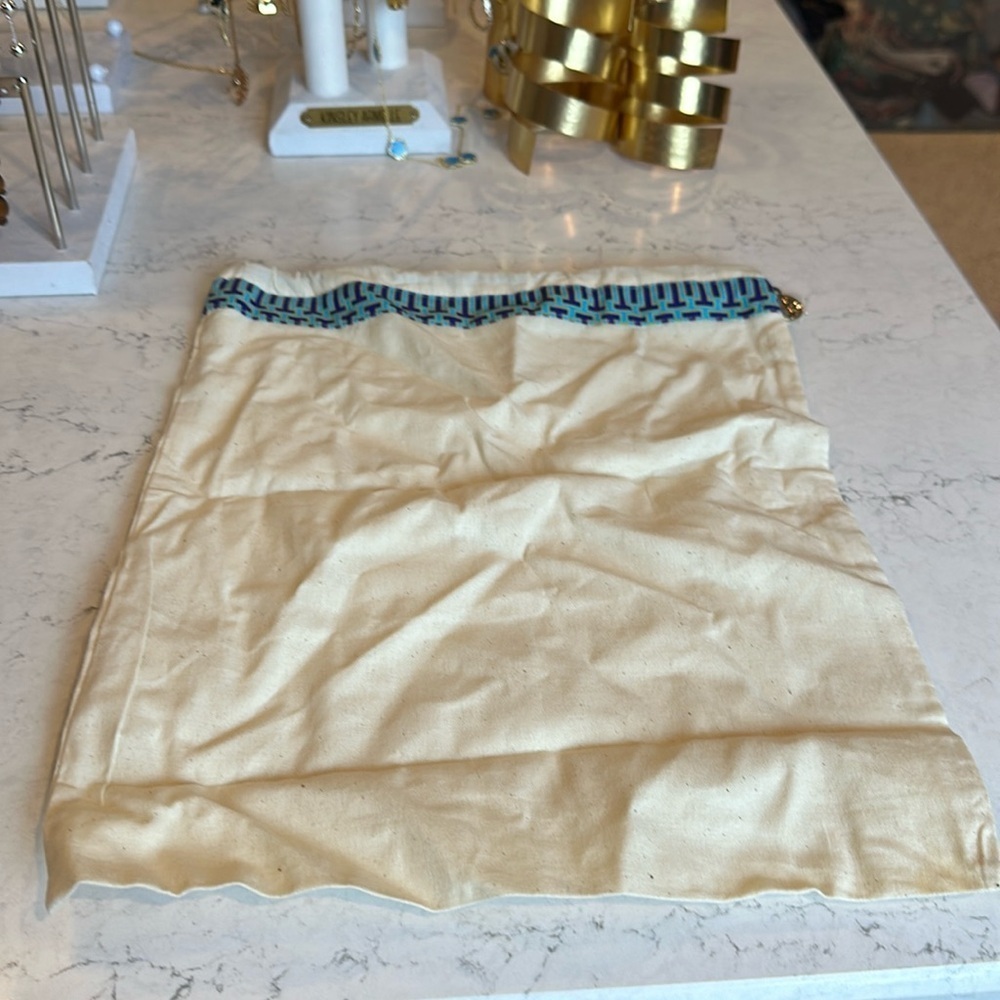 Tory Burch small cream with blue/purple design colored dust bag​